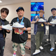EVO’s Mark Julio presenting both Daigo (L) and Justin Wong (R) with their shoes